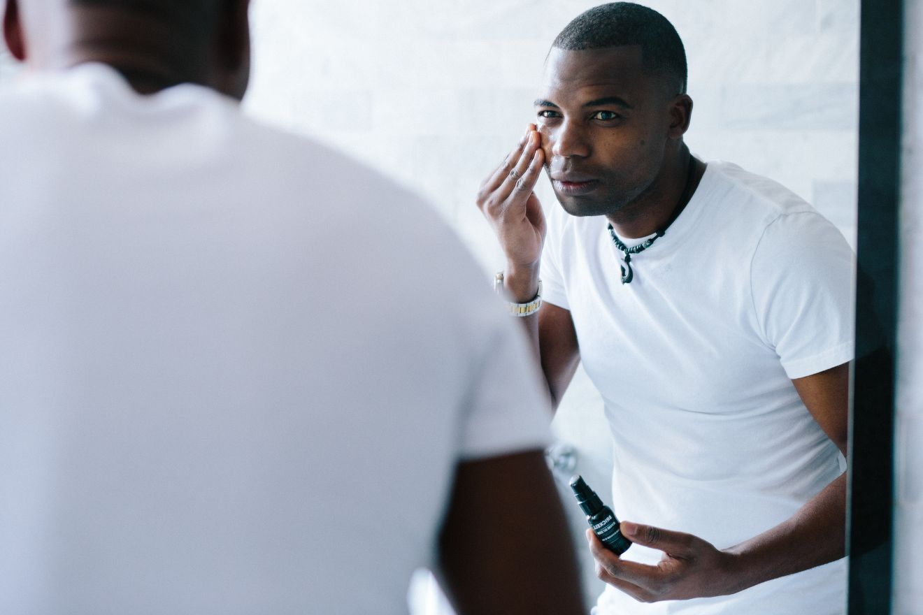 Man touching his face