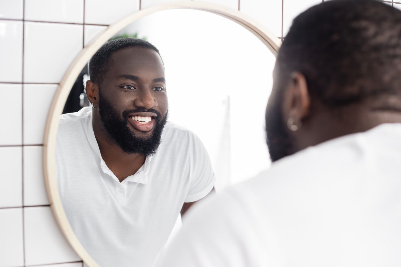 Man looking in mirror