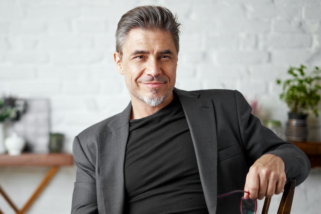 Man with healthy hair smiling