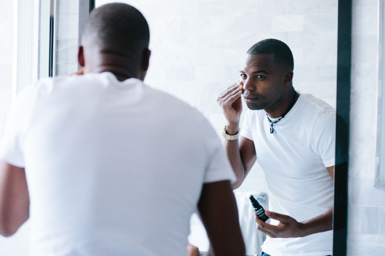 Man looking in mirror