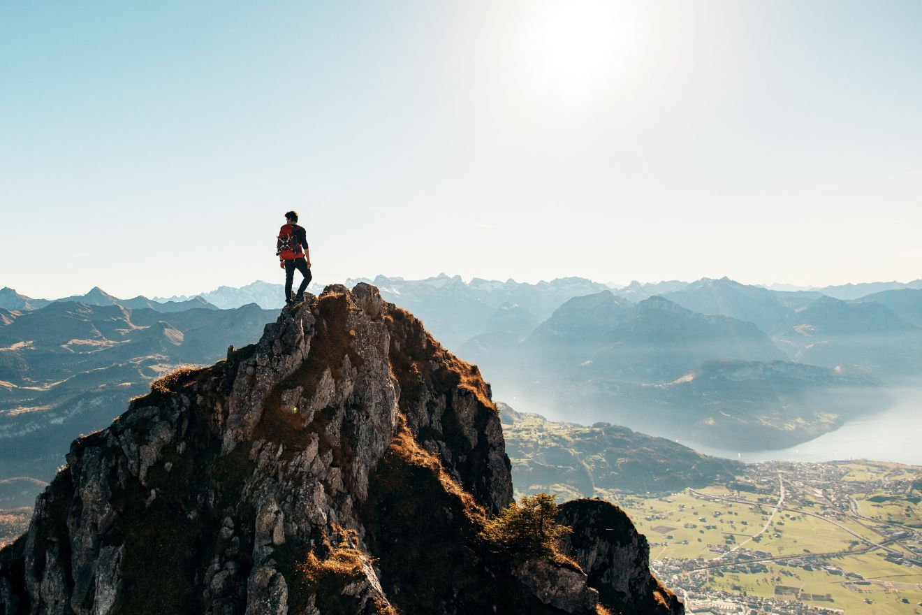 Man climbing mountain