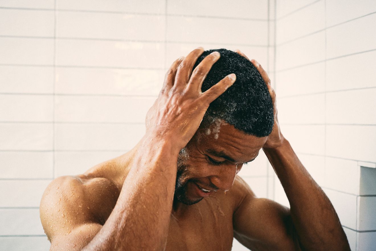 Man washing his hair